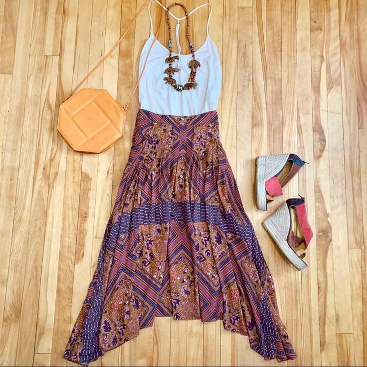 Free People Printed Paradise Midi Skirt Size 2 Color: Amber Side Pockets Pleating Around Top; Flowy Fit Back-Zip Closure Half-Lined Rayon Machine Wash Measurements Taken Flat: Waist: 14.5” Length (Front): 29” Length (Sides): 37” Purple Bohemian Maxi Skirt For Vacation, Bohemian Purple Maxi Skirt For Vacation, Bohemian Multicolor Skirt For Day Out, Bohemian Purple Maxi Skirt For The Beach, Purple Bohemian Lined Skirt, Bohemian Purple Lined Skirt, Purple Maxi Skirt For Summer Vacation, Purple Flowy Maxi Skirt For Beach, Purple Flowy Maxi Skirt For The Beach