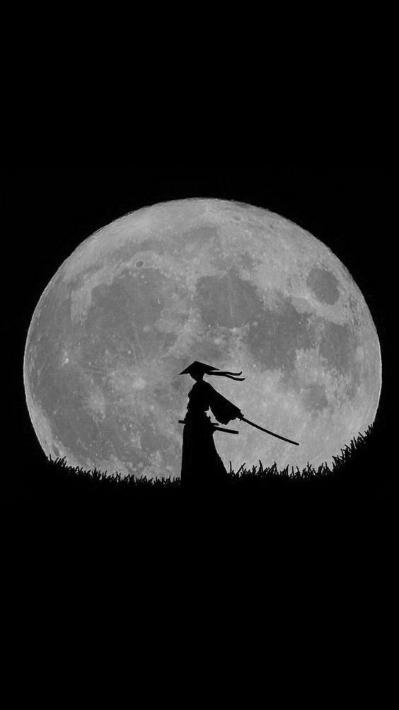 a black and white photo of a person with a bird on their shoulder in front of the moon