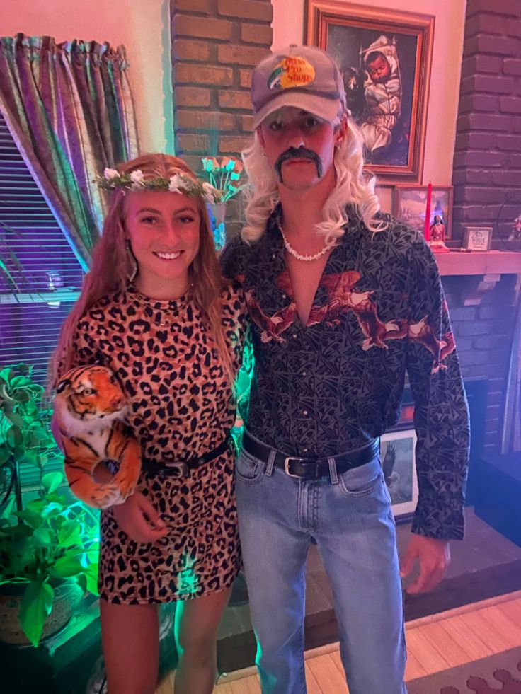 the man and woman are dressed up in costumes