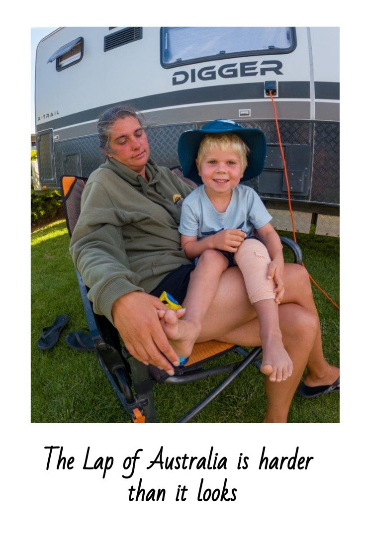 an older man sitting next to a young boy in a camping chair with the caption, the lap of australia is harder than it looks