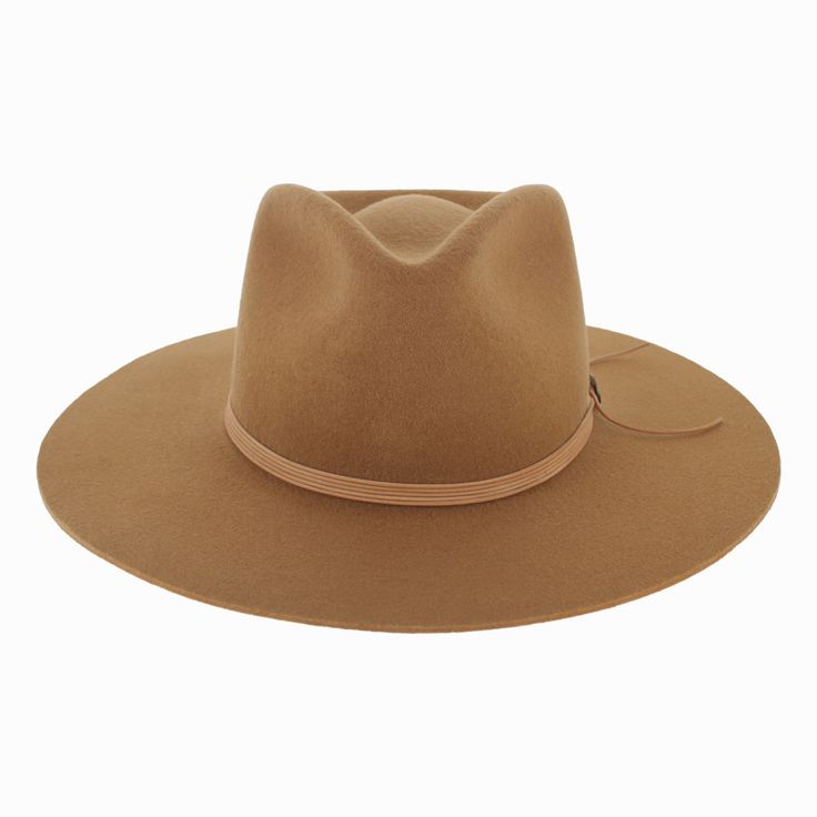 The American-made Stetson Mind's Eye captures western style in a classic silhouette with contemporary design. Hand blocked of a firm wool felt, it features a teardrop crown with a pronounced front pinch. A leather cord hat band finished with a brass Concho accent piece gives this flat brim fedora a Southwestern feel. The wide brim offers sun protection and holds its shape, wear after wear. The interior is fully lined and offers a genuine leather inner band for a comfortable fit. The Mind's Eye o The Mind's Eye, Pork Pie Hat, Hat Size Chart, Pork Pie, Style For Men, Shape Wear, Mind's Eye, Cloche Hat, Felt Hat