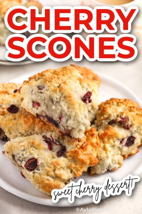 some scones on a plate with the words cherry scones