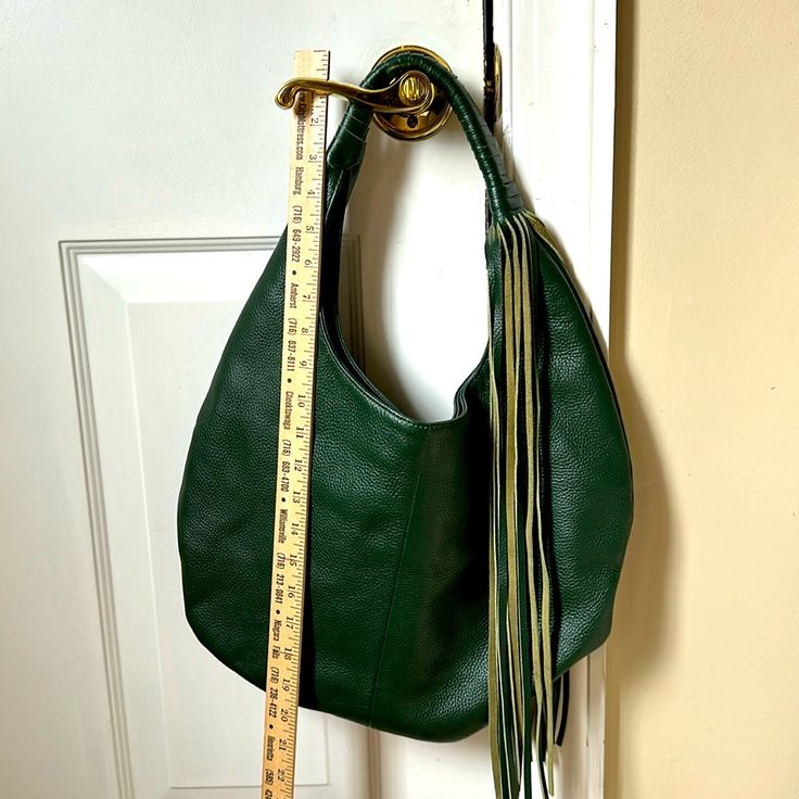 “B-Low The Belt”, Dark Green Genuine Leather, Pristine Condition Inside And Out, Large Shoulder Bag With Tassels. Has Inside Zipper And Slip Pocket. Magnetic Closure. Very Unique, One-Of-A Kind. Green Leather Hobo Bag With Handle Drop, Green Leather Bucket Hobo Bag, Green Hobo Bag With Removable Pouch, Green Hobo Bag With Handle Drop For Errands, B Low The Belt, Hobo Style, Belt Bags, Large Shoulder Bags, Leather Hobo