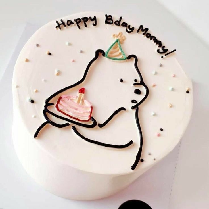 a birthday cake with a bear on it