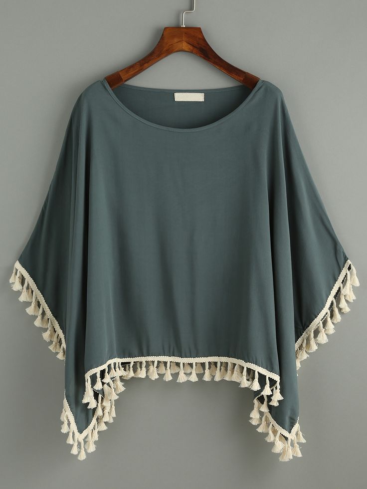 Shop Dark Green Tassel Trimmed Poncho Blouse online. SheIn offers Dark Green Tassel Trimmed Poncho Blouse & more to fit your fashionable needs. Ladies Tops Fashion Blouses, Trending Tops For Women, Summer Blouses For Women, Poncho Shirt, Poncho Fashion, Poncho Outfit, Poncho Design, Poncho Blouse, Kaftan Designs