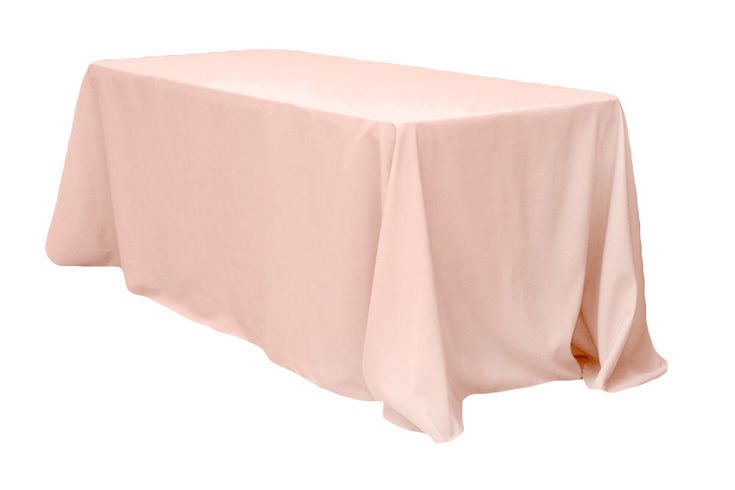 a pink tablecloth on a white background