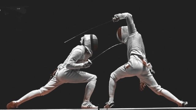 two men in white fencing suits doing tricks