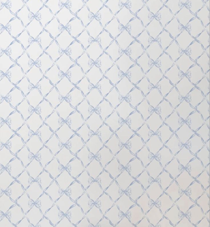 a white and blue wallpaper with an intricate design on it's surface,