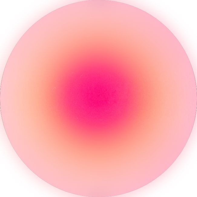 an orange and pink circular object is seen in this image, it appears to be blurry