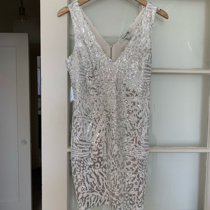 Forever 21 Animal Print Silver/White Sequin Party Dress Nwt Never Worn Comes With Tags. Super Cute And Flattering On, Perfect For Party Or Night Out White Glamorous V-neck Sequin Dress, White Fitted Sequin Dress For Holiday, White Glamorous Sequin Dress For Holidays, White Sequin Dress For Prom Party Season, Glamorous White Sequin Holiday Dress, White Sequin Dress For Prom And Party Season, White Sequin Prom Dress For Party Season, White Mini Dress For Prom And Party Season, Glamorous White Sequin Dress For Party Season