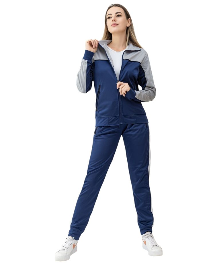 This women's 2-piece tracksuit features a full track jacket and jogger track pants. Stay stylish and comfortable with this versatile tracksuit, perfect for workouts or casual wear. Made of a premium quality tracksuit materials, this tracksuit provides a flattering fit and long-lasting wear. Upgrade your wardrobe with this jumpsuit 2-piece matching set. About this item1. Full Zip up Track jacket with 2 zippered side pockets, and a stand collar tracksuit2. Trimmed Jogger Track pants with 2 zippere 2 Piece Jumpsuit, Stylish Jumpsuit, Elastic Waistband Pants, Joggers Track Pants, Jogging Suit, Stylish Jackets, Royal Red, Tapered Pants, Tracksuit Women