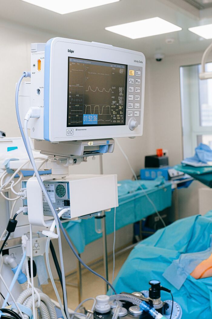 an operating room with medical equipment in it