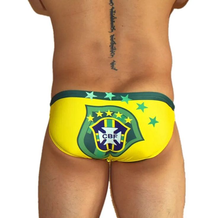 This Brazil Flag swim brief is made for maximum comfort and style. The fabric is made of polyester and spandex. Swim briefs are ideal for water sports or beach tanning. This design pays homage to Piet Mondrian's iconic artwork. This design was showcased as the signature item of the period novum collection during Columbus Fashion Week. Every guy wants to escape the ocean like an action hero, and you can now! We reinvented this classic swim trunk with a sensual style based on the traditional and s Brief Style Beachwear Swim Trunks, Beachwear Brief Swim Trunks, Sporty Moisture-wicking Swim Briefs, Beachwear Swim Trunks In Brief Style, Beach Season Swim Trunks Brief, Sporty Swimwear Briefs For Sports, Sporty Swimwear Briefs For Swimming, Sporty Brief Swimwear For Swimming, Sporty Water Polo Brief Swimwear