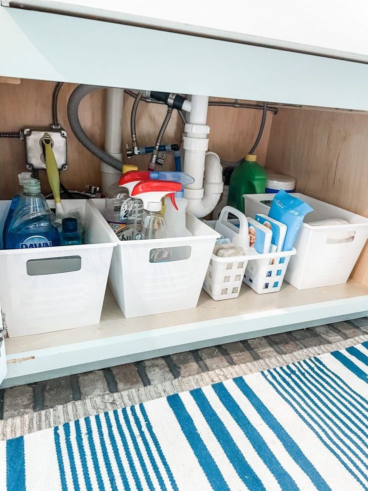 dollar tree under the sink organization - Re-Fabbed Under Sink Storage Ideas, Sink Storage Ideas, Under The Kitchen Sink Organization, Under The Sink Organization, Bathroom Organization Hacks, Under Kitchen Sink, Bathroom Storage Hacks, Sink Organization, Under Kitchen Sink Organization