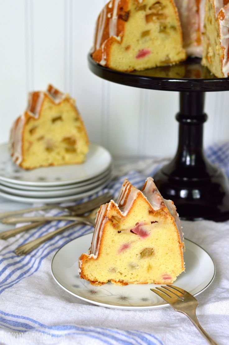 a bundt cake on a plate with a slice cut out and ready to be eaten