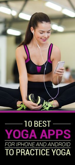 a woman is sitting on the floor with headphones and looking at her cell phone