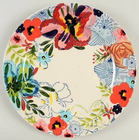 a plate with flowers painted on it