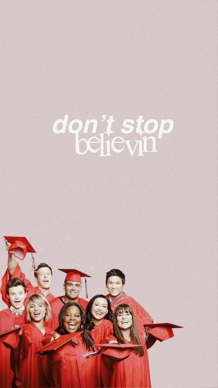 a group of people in red graduation gowns and caps with the words don't stop believin