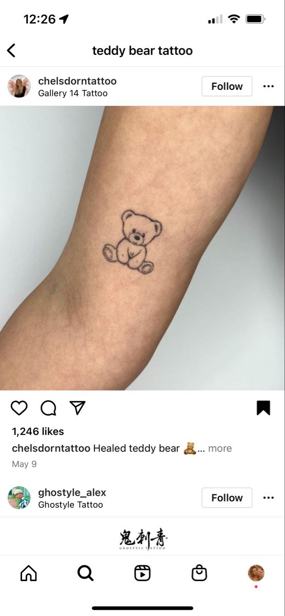 a small teddy bear tattoo on the arm