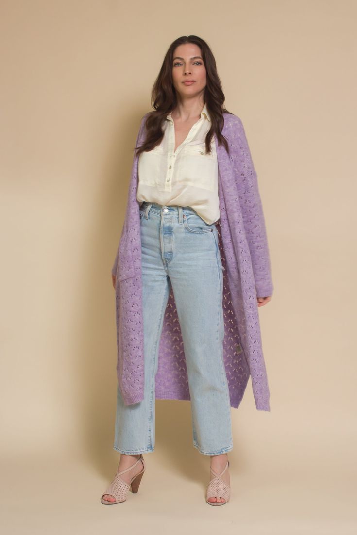 Brand: FRNCH Eyelet cardigan in the prettiest heather lilac. Sweater features square front pockets. ♡ Details Color: Lilac Eyelet design Front pockets 55% Acrylic, 28% Polyester, 10% Wool, 5% Polyamide, 2% Elastane Sizing Model Info: Height 5'3"| Bust 34"| Waist 25"| Hips 34" Model is wearing a size S/M Fit: Standard fit Stretch: More stretch Measurements: S/M: Bust 47" | Length 42.5" M/L: Bust 48" | Length 42.5" Spring Cable Knit Outerwear For Loungewear, Long Sleeve Open Knit Cardigan For Loungewear, Spring Pointelle Knit Cardigan For Daywear, Spring Cable Knit Open Front Cardigan, Spring Open Front Cable Knit Cardigan, Daywear Pointelle Knit Cardigan, Spring Cable Knit Loungewear Cardigan, Long Sleeve Pointelle Knit Cardigan For Daywear, Spring Cable Knit Cardigan For Loungewear