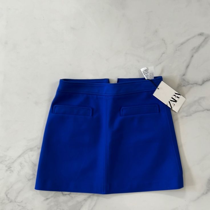 Brand New Never Worn Zara Mini Skirt In Blue Blue Stretch Mini Skirt With Pockets, Stretch Blue Mini Skirt With Pockets, Blue High Waist Skort With Pockets, Blue High-waist Skort With Pockets, High Waist Blue Skort With Pockets, Chic Blue Skirt With Pockets, Blue Fitted Skirt With Pockets, Fitted Blue Skirt With Pockets, Blue Mini Skort With Pockets