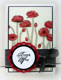 a thank you card with red flowers and black ribbon around the edge, on a white background