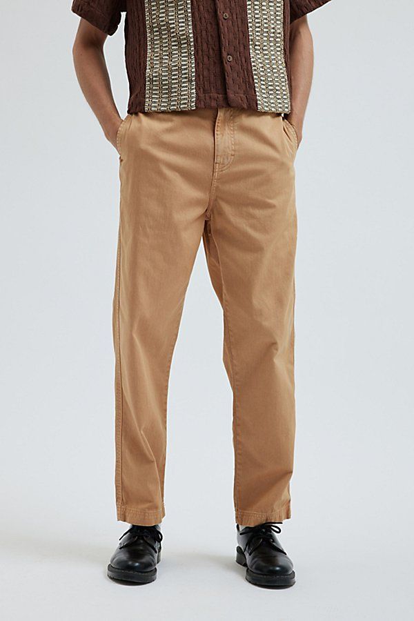 Utility chino pants by UO’s own BDG label. Cotton twill pants with a straight leg silhouette and mid-rise waist. Includes front and back pockets & finished with a zip fly & button closure. Urban Outfitters exclusive. Features BDG utility chino pants Essential cotton twill pants Mid rise waist Washed look Zip fly; button closure Straight leg UO exclusive Content + Care 100% Cotton Machine wash Imported Size + Fit Model in Black is 6’1" and wearing size 32/32 Measurements taken from size 32/32 Rise: 11" Inseam: 30" Leg opening: 8" | BDG Utility Chino Pant in Tan, Men's at Urban Outfitters Casual Straight Chinos With Belt Loops, Casual Chino Cotton Twill Work Pants With Belt Loops, Casual Chinos With Tapered Leg And Belt Loops, Casual Tapered Leg Chinos With Belt Loops, Casual Straight Cargo Pants For Workwear, Straight Fit Chinos With Tapered Leg And Pockets, Casual Chino Cotton Twill Pants With Belt Loops, Casual Chino Pants With Belt Loops, Casual Tapered Straight Bottoms