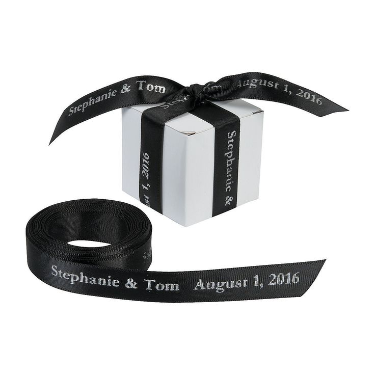 two black and white gift boxes tied together with a ribbon that says stephanie & tom august 1, 2016