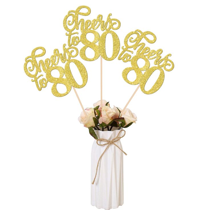 there is a vase with flowers in it and the number eighty birthday cake topper