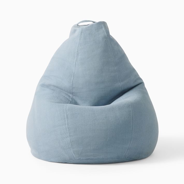 a blue bean bag sitting on top of a white floor