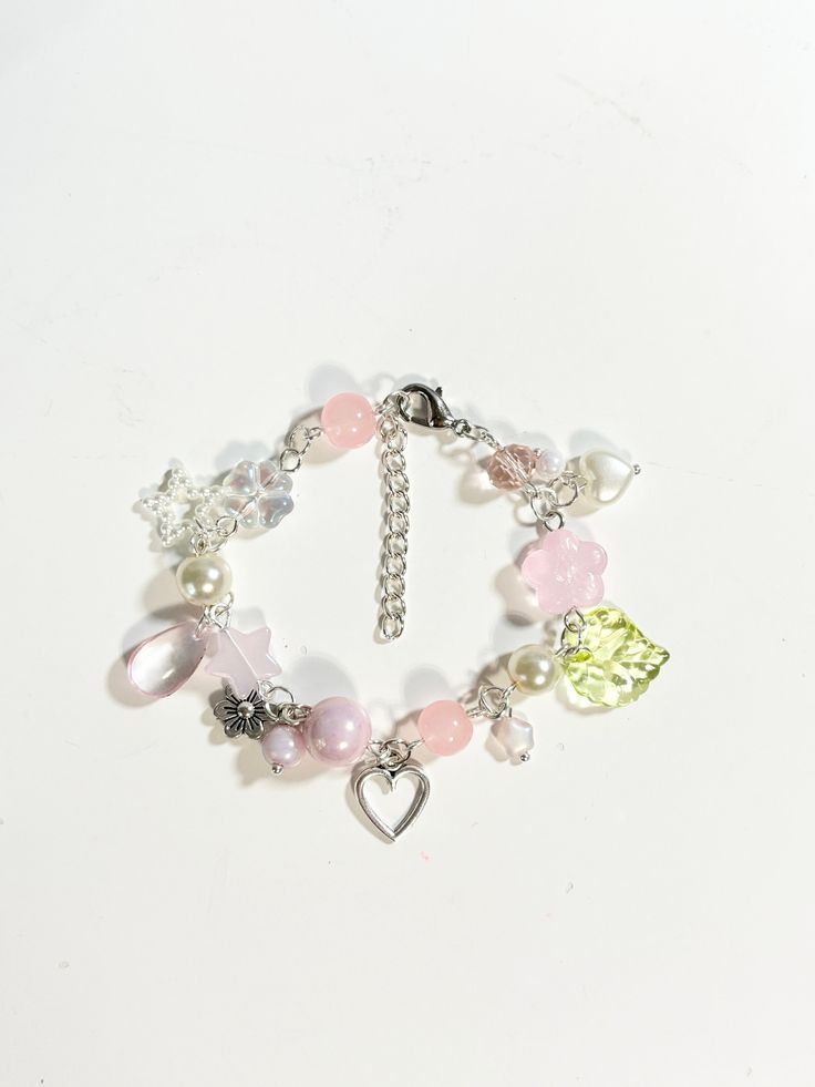 adjustable 8.5" Handmade Whimsical Charm Bracelet For Friendship, Pink Themed Adjustable Charm Bracelet, Adjustable Pink Themed Charm Bracelet, Pink Handmade Themed Bracelets, Handmade Adjustable Whimsical Bracelets, Themed Handmade Pink Bracelets, Handmade Themed Pink Bracelets, Whimsical Handmade Adjustable Bracelets, Pink Adjustable Themed Charm Bracelet