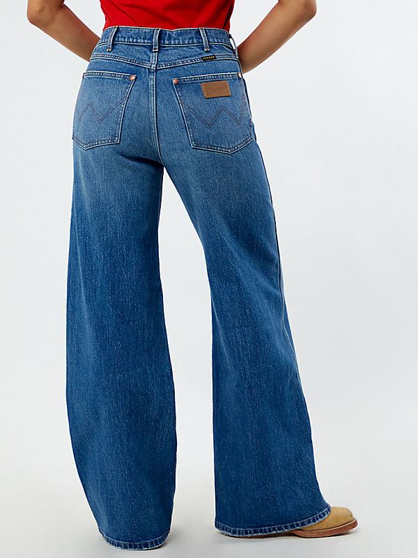 Embrace laid-back style with the Wrangler x PacSun Raver Low Rise Baggy Jeans. Crafted from slight stretch fabric, these jeans feature a low-rise waist, zip-fly closure, and a classic 5-pocket design. The wide leg openings and relaxed baggy fit ensure comfort and ease, while the W embroidery, Wrangler leather back label, and PacSun woven label add authentic touches. Wrangler Wide Leg Jeans, Wrangler Jeans Women's, Low Rise Baggy Jeans, Baggy Jean, Pacsun Jeans, Woven Label, Wrangler Jeans, Laid Back Style, Baggy Jeans