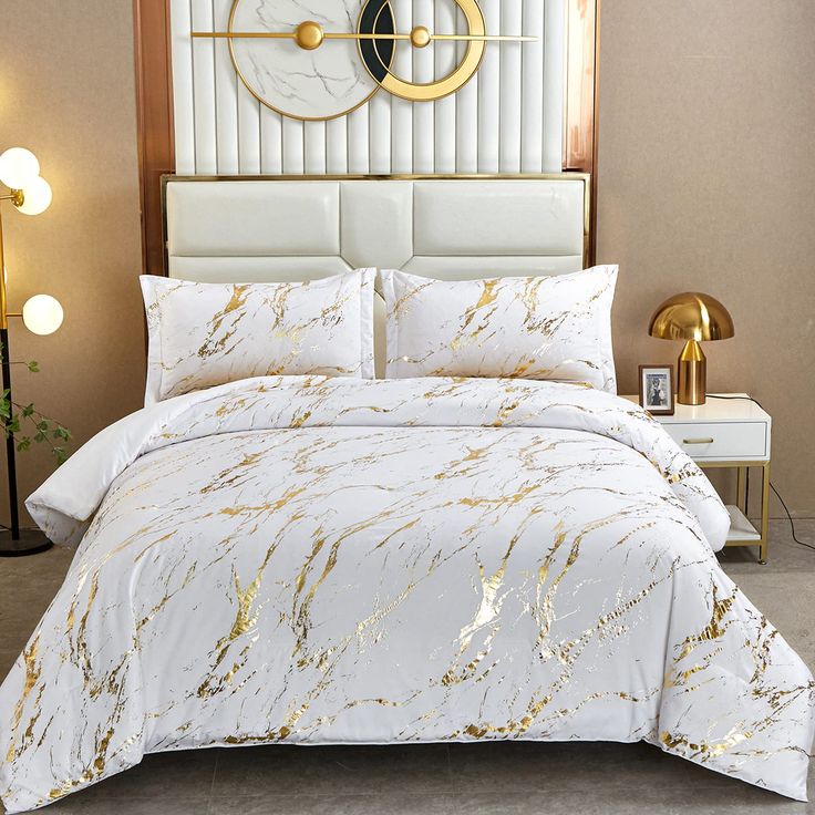 PRICES MAY VARY. 【MARBLE METALLIC GLITTER DESIGN】Classic marble texture mixed with a shiny gold metallic foil pattern on a white background gives you perfect visual feast, bringing your bedroom a luxurious and warm happiness. 【3 PIECES GOLD COMFORTER SET】Gold comforter set QUEEN SIZE included a comforter(90" x 90") and 2 envelope pillowcases 20" x 28" . Gold marble comforter is perfect gift choice for your family and your friends, suits for ALL SEASONS. 【SUPER SOFT&DURABLE】 White gold metallic m Gold Comforter Set, Marble Comforter, Gold Comforter, Bed Comforter Sets, Gold Bedroom, Bedding Duvet, King Comforter Sets, Queen Comforter Sets, Duvet Bedding Sets