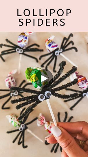 lollipop spider candies on a stick with the text lollipop spiders