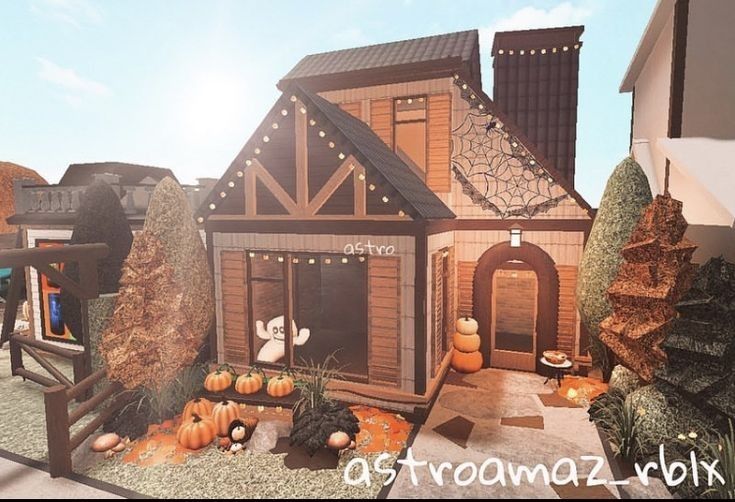 an animated house with pumpkins on the ground