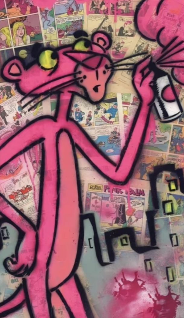 a pink painting with lots of stickers on it's face and arms, holding a bottle