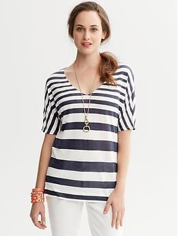 Striped Dolman-Sleeve Shirt Casual V-neck Blouse With Rolled Sleeves, Oversized V-neck Casual Tops, Trendy Oversized V-neck Blouse, Trendy V-neck Short Sleeve Top For Day Out, Chic Oversized Striped Top, Oversized V-neck Shirt For Summer, Chic Oversized V-neck Shirt, Elegant V-neck Short Sleeve Top For Summer, Elegant V-neck Short Sleeve Summer Top