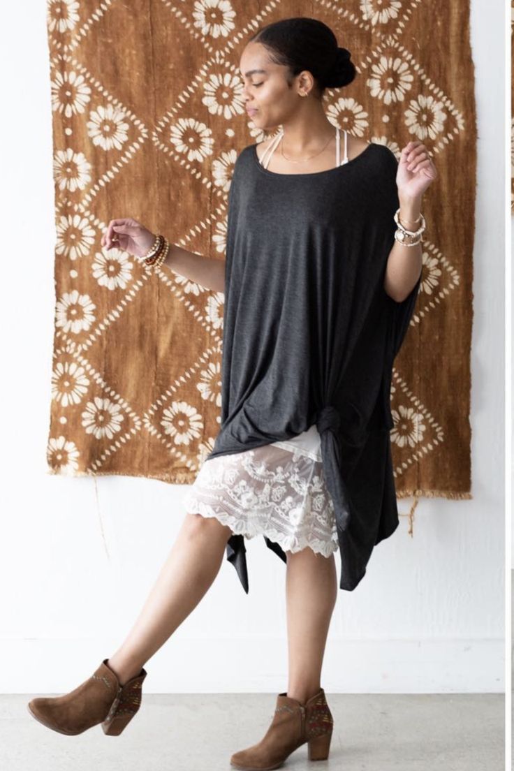 As a dress or tunic top, this cute and comfy piece has a trendy, slouchy silhouette. This closet favorite is a one-size piece that can be layered over tanks and bralettes, worn on or off-the-shoulder, and styled with a knot in the hem. OS sizing fits most* sizes US 0-18 Approximate measurements laying flat: Chest 56", Length: 32", Bottom Opening: 56" Fabric: 95% Rayon, 5% Spandex Hand wash cold, Lay flat to dry Made in Mexico Casual Stretch Tunic For Summer, Casual Flowy Tunic For Loungewear, Flowy Casual Tunic For Loungewear, Chic Oversized Tunic For Loungewear, Chic Tunic For Spring Loungewear, Versatile Summer Loungewear Dresses, Versatile Layering Dresses For Spring, Casual Stretch Dresses For Layering, Versatile Spring Layering Dresses