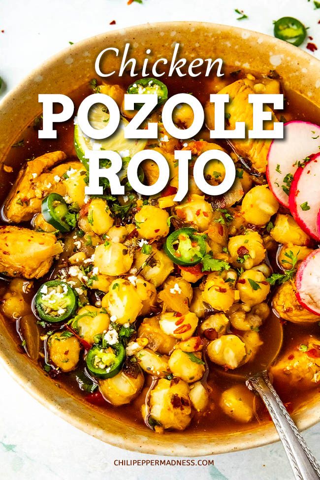 chicken pozole rojo in a bowl with radishes