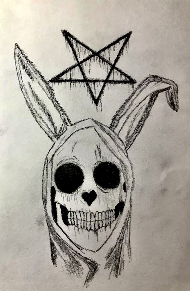 a drawing of a rabbit with a pentagramil on it's head