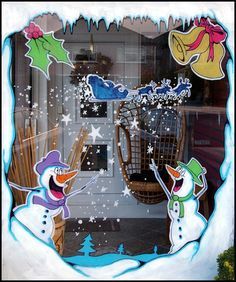 a window decorated with snowmen and christmas decorations