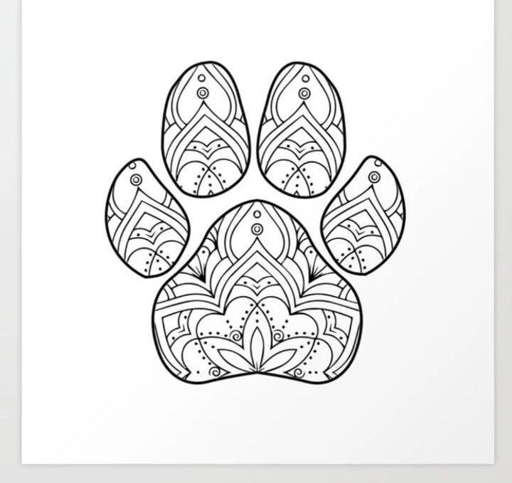 an animal's paw is shown in this black and white image, with intricate patterns