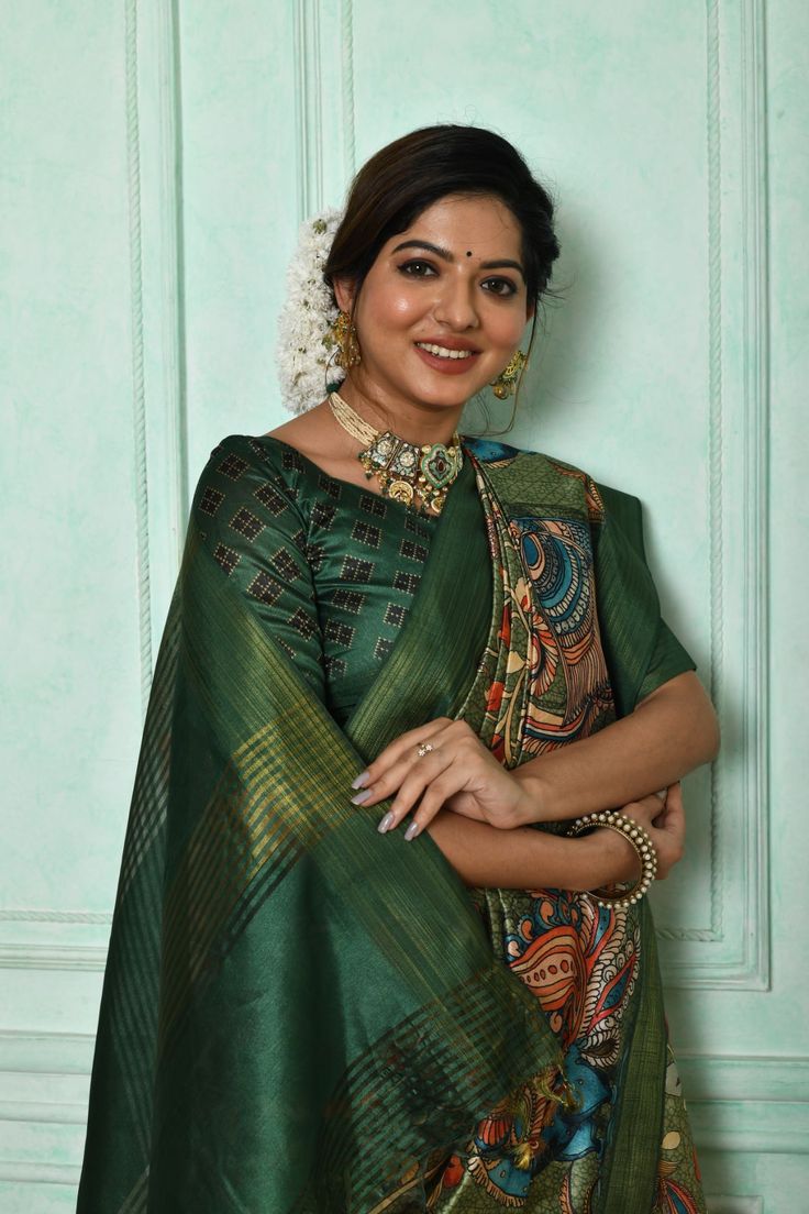 Saree Fabric : Silk Saree Color : Crocodile Green Saree Length : 5.5 Meter Blouse Length : 0.8 Meter Saree Work : Printed Saree Border : Woven Border Wash : Dry Clean Formal Tussar Silk Pre-draped Saree, Green Cutdana Pre-draped Saree, Silk Pre-draped Kalamkari Saree, Formal Green Semi-stitched Saree, Festive Tussar Silk Dress, Green Bollywood Saree For Formal Occasions, Formal Green Bollywood Saree, Formal Fitted Green Saree, Festive Green Tussar Silk Blouse