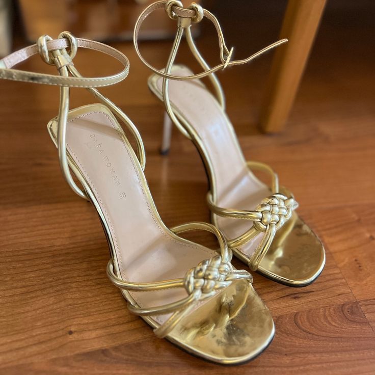 Gold Metallic Strappy Heeled Sandals, Knotted Decoration Over Toes And Buckles At Ankles. Brand New, Never Worn... Minor Scuff/Scratches To Both Shoes (See Pics), 3 1/2” Heels. Eu 38/Us 7.5 Fits More Like A 7. Affordable Zara Block Heels, Formal Zara Sandals With Wrapped Heel, Zara Formal Sandals With Wrapped Heel, Zara Heels With Wrapped Heel For Formal Occasions, Zara Formal Heels With Wrapped Heel, Zara High Heels For Cocktail Occasions, Zara High Heels For Cocktail, Elegant Zara Sandals With Wrapped Heel, Zara High Heels For Cocktail Events