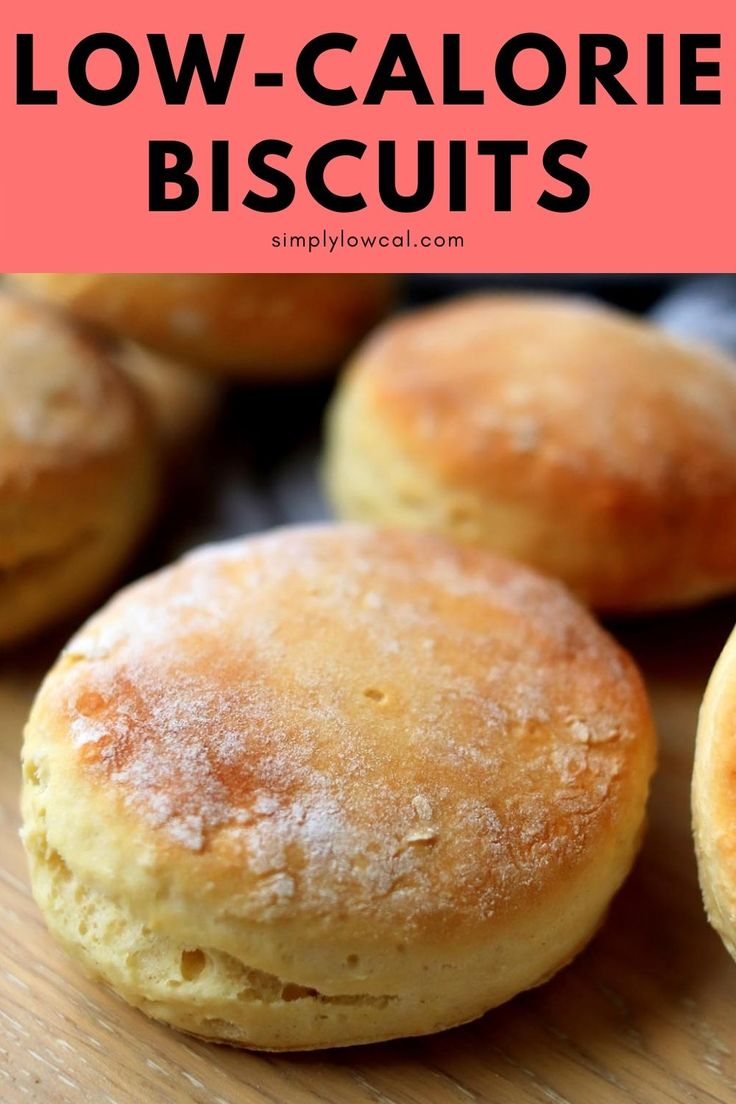 low - calorie biscuits on a cutting board with blueberries in the background