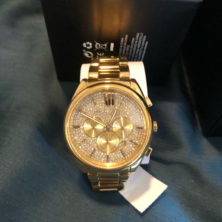 Brand New Beautiful Watch Color Gold Luxury Analog Diamond Watch With Round Dial, Designer Gold Watches With Subdials, Designer Gold Chronograph Watch, Luxury Gold Chronograph Watch With Date Display, Luxury Jewelry With Analog Display And Round Dial, Elegant Chronograph Watch With Date Display As Gift, Modern Gold Chronograph Watch With Diamond Hour Markers, Luxury Gold Chronograph Watch With Analog Display, Elegant Gold Chronograph Watch With Diamond Hour Markers