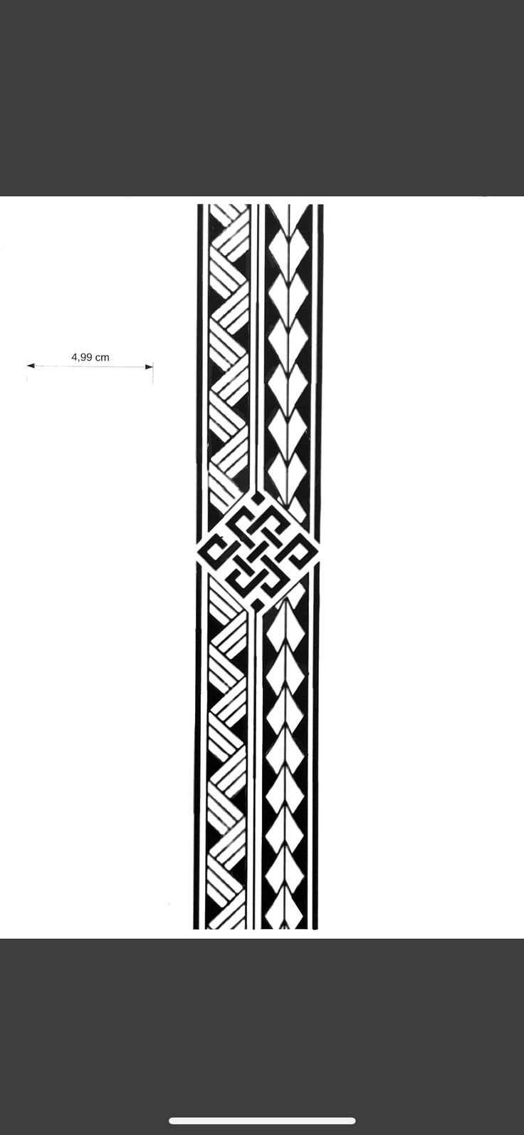 an image of a black and white pattern on the side of a tall column with geometric designs