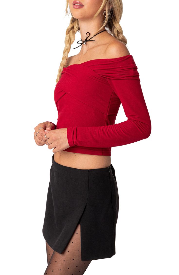 Elevate your night-out style with this bright and bold crop top featuring a shoulder-baring neckline. Off-the-shoulder neck Long sleeves 95% polyester, 5% spandex Machine wash, dry flat Imported Stretch One Shoulder Crop Top For Night Out, Cropped One Shoulder Top For Party, Fitted One Shoulder Crop Top For Night Out, One Shoulder Fitted Crop Top For Fall, Fitted One-shoulder Crop Top For Fall, Trendy Off-shoulder Crop Top For Parties, One-shoulder Stretch Top For Date Night, One Shoulder Stretch Top For Date Night, Fitted Off-shoulder Foldover Top For Party