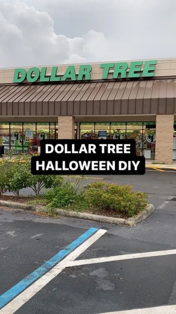 dollar tree halloween sale sign in front of the store's entrance and parking lot