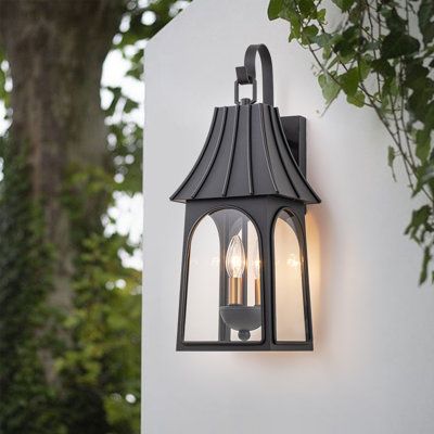 an outdoor wall light with two lights on it